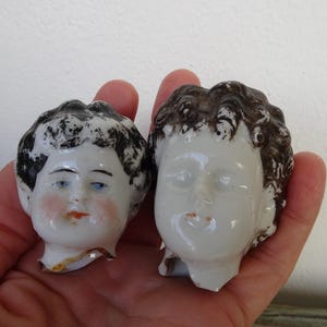 Two,broken,glazed,Antique,China doll heads,parts,flawed,Thuringia,German doll fragments.