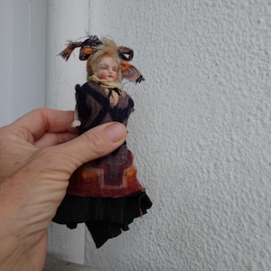 antique,bisque,10 cm.or 4&#39;&#39; German,mignonette doll,wire jointed arms,fixed head & legs.