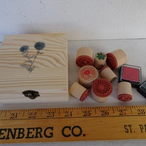 8 unused,small,wood & rubber,round,floral stamps,in plain pine,wooden box