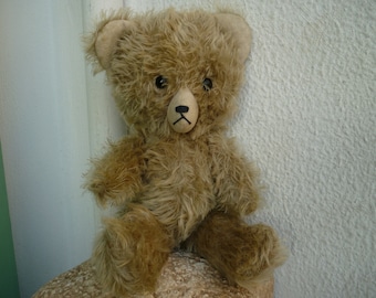 vintage,big headed,soft stuffed,small,mohair bear,fixed head jointed limbs,black,glass eyes.