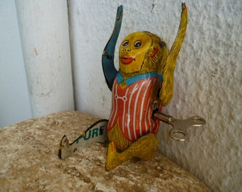 Vintage,1950's,tin,wind up,ape,monkey,somersaulting,flipping,working.