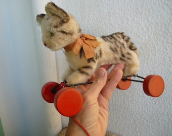 vintage,Steiff,mohair,tabby cat on wheels,wood stuffed,Silverscript ear button & orig.ribbon.