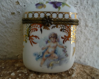 vintage,hand painted cherubs,needle,pill,match or trinket box,porcelain,glazed ceramic,angels,pansies,ornate gilt highlights.