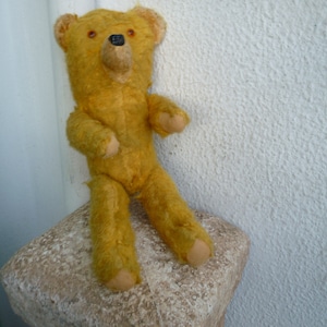 small,11 1/2&#39;&#39;vintage,primitive,plush,wood stuffed,teddy bear,wire jointed limbs,fixed head.