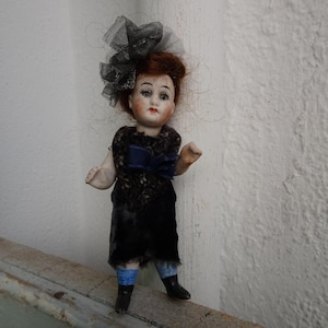 antique,all bisque,11 cm.or 4 1/2&#39;&#39; German,mignonette doll,wire jointed limbs.