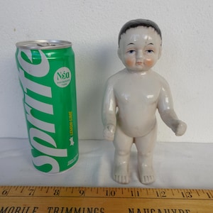 Flawed,6 1/2&#39;&#39; vintage,frozen Charlie,Porcelain,glazed ceramic,German doll.Badepuppe,bath doll.broken head with missing pieces,