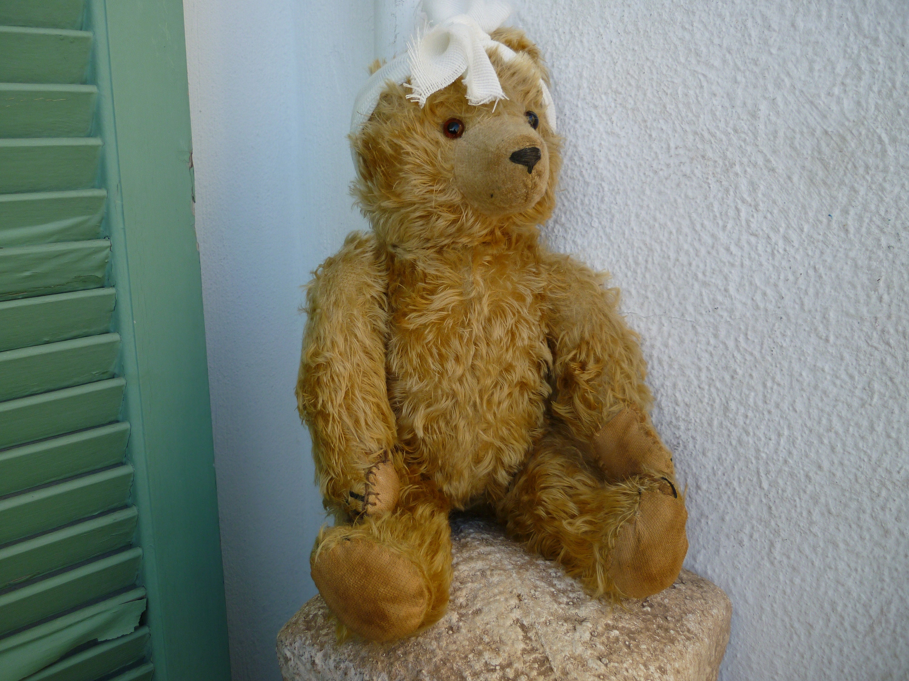 Ancien ours vintage rembourré paille ou crin peluche