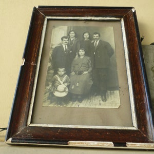 antique,wood framed,family photograph print,as found,very worn with much loss.
