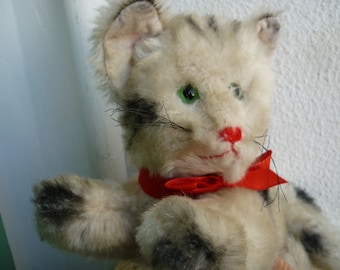 vintage,plush,German cat,unjointed,reclining position,glass eyes.