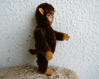 1930's 5'' yes/no,tricky,Schuco monkey,ape,metal face,mohair over metal body,jointed limbs.