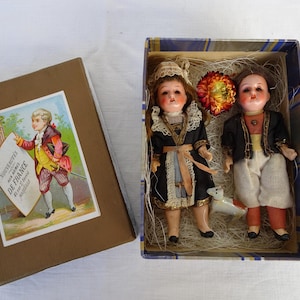 Pair antique,bisque head,compo bodies,German mignonette dolls,5 1/2&#39;&#39; German,fixed eyes,teeth,original costumes & dog,hand decorated box