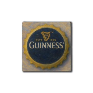 May include: A square painting of a Guinness bottle cap. The cap has a gold-colored, ridged edge and a dark blue center with the Guinness logo, a harp, and the text "ESTD 1759". The background is a light beige.