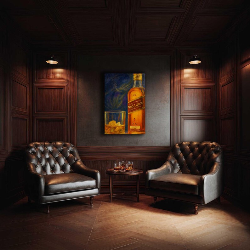 May include: An interior scene featuring a painting of a whiskey bottle and a glass, with two tufted leather armchairs. The room has dark wood paneling, a small round table with glasses, and a herringbone wood floor. Two small lights are mounted on the wall.