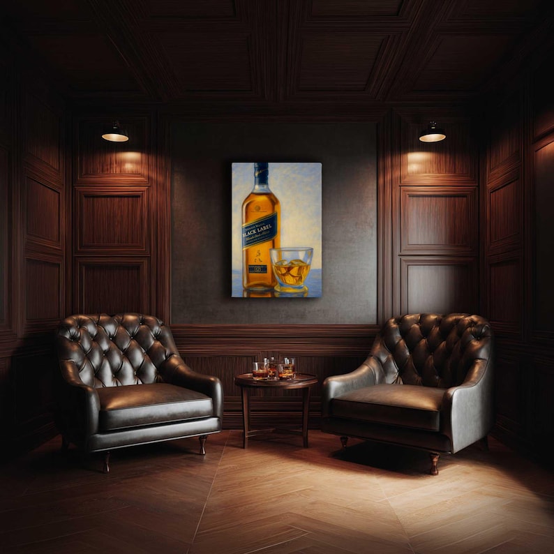 May include: An oil painting of a bottle of Johnnie Walker Black Label whiskey and a glass of whiskey with ice. The painting hangs on a dark wall in a room with two leather armchairs and a small table.