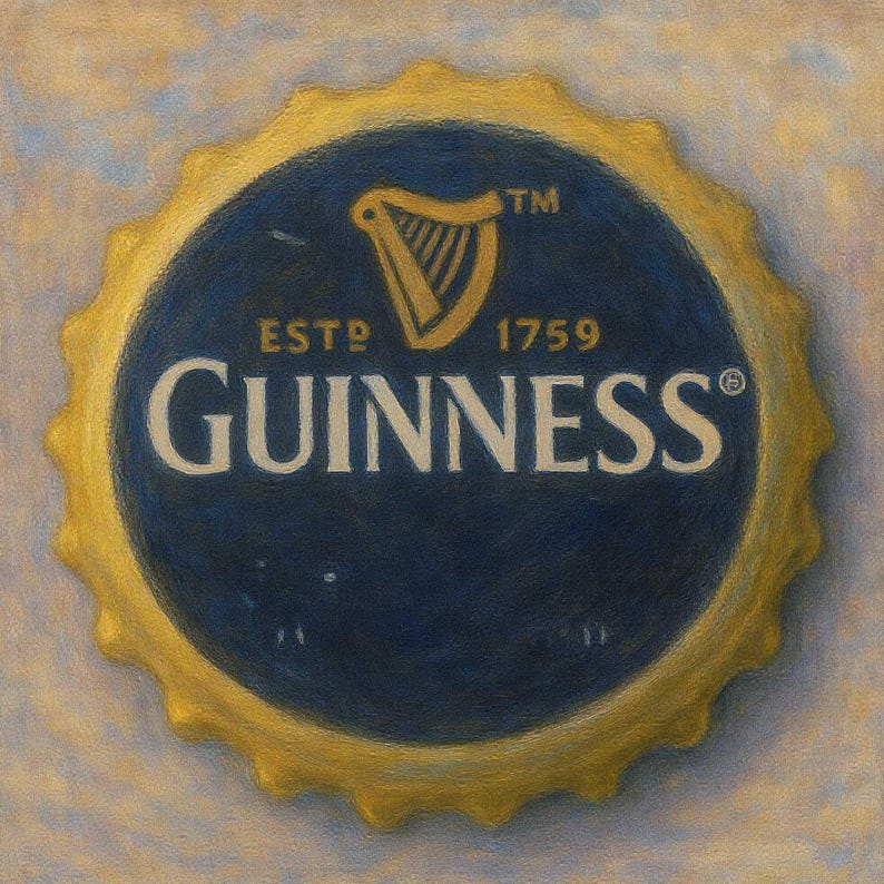 May include: A close-up of a Guinness bottle cap. The cap features a dark blue center with the Guinness logo in white, including a harp symbol and the text "ESTD 1759". The outer edge is gold-colored and has a ridged design.