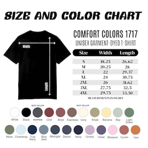 May include: A black unisex garment-dyed t-shirt with a size and color chart. The chart includes measurements in inches for width and length, ranging from size S to 4XL. A color palette displays various shades.