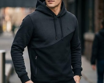 Sudadera con capucha negra para hombre, estilo minimalista ajustado, urbano y urbano.