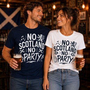 May include: A navy blue t-shirt and a white t-shirt, both featuring the text NO SCOTLAND NO PARTY, a lion graphic, musical notes, and small Scottish flag icons. The navy shirt has white text, while the white shirt has dark blue text.