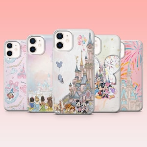 May include: Five phone cases with colourful Disney-themed designs. The cases feature illustrations of castles, characters, and fireworks. The cases are in various shades of pink, blue, and white, with some text visible.