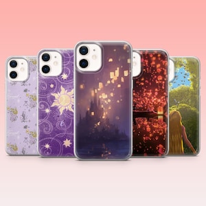 May include: Five clear phone cases with colourful designs. The cases feature images of a castle, lanterns, and a sun. The cases are in various shades of purple, orange, and green. The cases are for a smartphone.