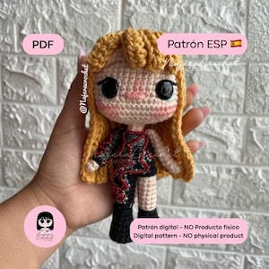 May include: A handmade crochet doll with blonde hair and a black and red outfit. The doll has large black eyes and rosy cheeks. The image includes text that says "PDF", "Patrón ESP", and "Digital pattern - NO physical product".