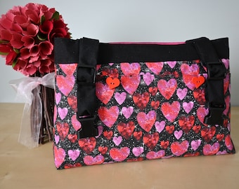 Powerchair bag, wheelchair purse, walker organizer, wheelchair accessory:  Lots of Hearts print bag with a hot pink lining.