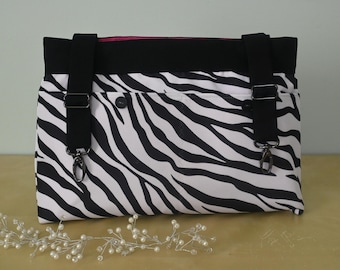 Fun Zebra Print bag with Hot Pink lining.