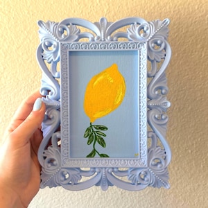 Lemon on Blue Framed Canvas