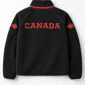 May include: A rustic wooden sign with the text "Welcome to our home" in white lettering. The sign features a distressed finish and a simple, inviting design, perfect for entryway decor.