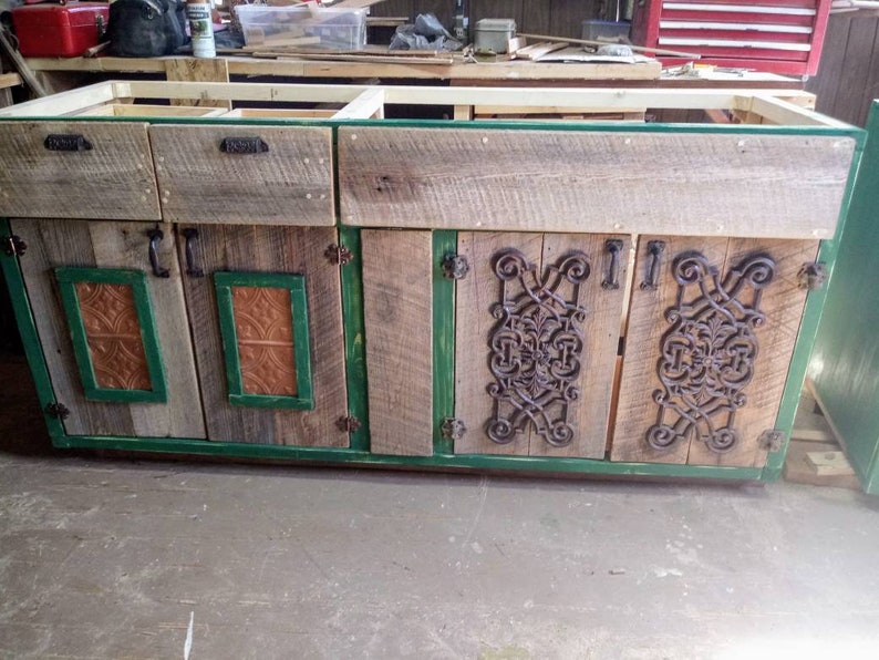 Custom Kitchen Cabinetry Built With Old Barn Wood And Vintage Ceiling Tin Hardware Farmhouse Style Cabinet