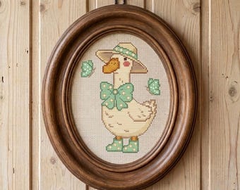 Alberne Gans in Stiefeln Kreuzstichmuster, Quackster in grünen Stiefeln & Schleife, Cottagecore Frühlingsstickerei, anfängerfreundlich, Musterbewahrer