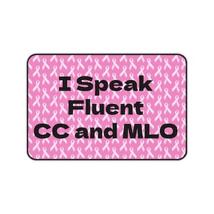 May include: A rectangular pink sticker with a black border. The sticker has a pattern of white ribbons on a pink background. The text "I Speak Fluent CC and MLO" is in black, bold font.