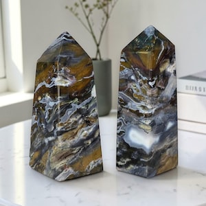 Luxury home decor styling featuring polished ocean jasper crystal points