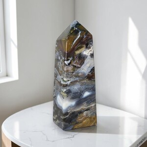 Natural ocean jasper obelisk with earthy brown, gray and white patterns