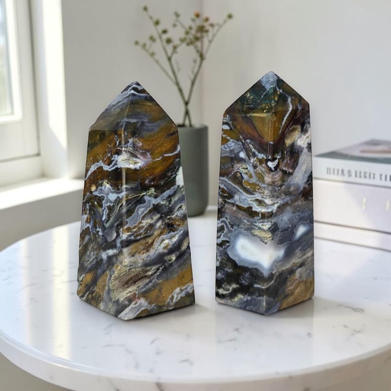 Luxury home decor styling featuring polished ocean jasper crystal points