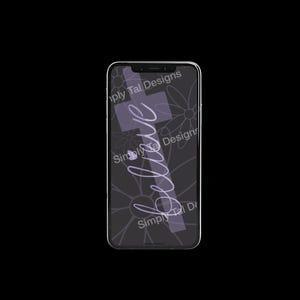 May include: A smartphone displaying a dark gray wallpaper featuring a light purple cross, a white cursive script reading "believe," and a repeating floral pattern. The text "Simply Tal Designs" is overlaid diagonally across the screen multiple times.