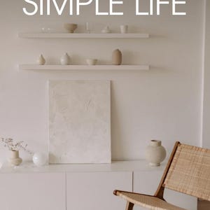 May include: A set of three ceramic mugs with a speckled, matte finish. The mugs are in shades of cream, light gray, and dark gray. Each mug has a simple, minimalist design and a rounded handle.