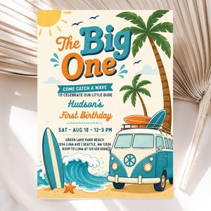 May include: A rectangular invitation card featuring a beach theme with a blue van, surfboards, palm trees, a sun, and a wave. The text reads: The Big One, Come Catch A Wave To Celebrate Our Little Dude, Hudson's First Birthday, Sat - Aug 18, 12-3 PM.