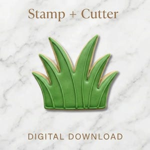 以下が含まれることがあります： 緑色の草の形をしたクッキーカッターとスタンプセット。草のデザインは、薄茶色の輪郭を持つ複数の草の葉が特徴です。「Stamp + Cutter」と「デジタルダウンロード」という言葉が画像に表示されています。