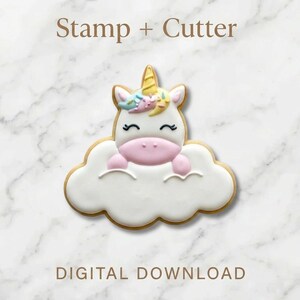 May include: A unicorn cookie cutter and stamp set. The cookie is shaped like a unicorn peeking over a cloud. The unicorn has a yellow horn, a pink muzzle, and a colourful mane. The text "Stamp + Cutter" and "DIGITAL DOWNLOAD" are visible.