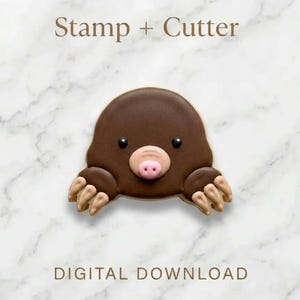 May include: A brown mole-shaped cookie cutter with a pink nose and tan claws. The cookie cutter is decorated with black eyes and a light brown outline. The text "Stamp + Cutter" and "DIGITAL DOWNLOAD" are above and below the cookie cutter.