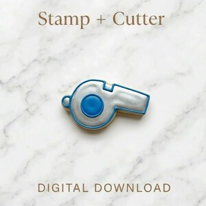 May include: A whistle-shaped cookie cutter and stamp with a silver and blue design. The text "Stamp + Cutter" is at the top, and "DIGITAL DOWNLOAD" is at the bottom. The cookie cutter is on a white marble surface.