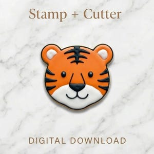 May include: A tiger face cookie cutter and stamp set. The tiger face is orange with black stripes and a white muzzle. The text "Stamp + Cutter" and "DIGITAL DOWNLOAD" are at the top and bottom of the image.