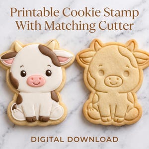 May include: Two cow-shaped biscuits, one decorated and one a cutter, are on a marble surface. The decorated biscuit has white icing, brown spots, and a pink nose. The text at the top reads "Printable Cookie Stamp With Matching Cutter".