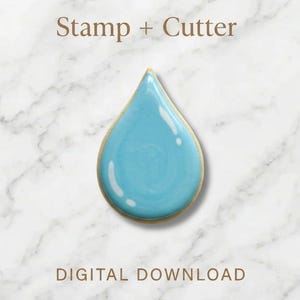 Puede incluir: Cortador de galletas en forma de lágrima azul claro con borde dorado. Las palabras "Stamp + Cutter" y "Digital Download" se muestran en texto marrón.