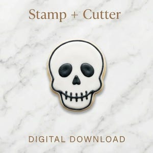 May include: A skull-shaped cookie cutter and stamp. The cookie is white with black eyes, nose, and mouth details. The text "Stamp + Cutter" and "DIGITAL DOWNLOAD" are displayed on a marble background.