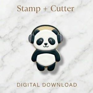 May include: A panda-shaped cookie cutter and stamp set. The panda has black and white frosting and wears gray headphones. The text "Stamp + Cutter" and "DIGITAL DOWNLOAD" are displayed above and below the cookie.