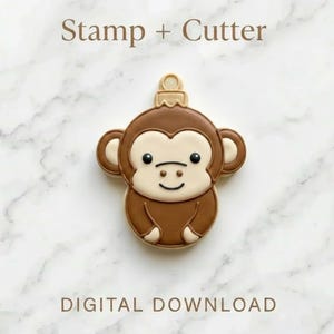 Könnte beinhalten: Ein braunes Affen-Ausstecher- und Stempelset. Der Affe hat ein hellbraunes Gesicht und Ohren, mit einem lächelnden Mund und schwarzen Augen. Der Text "Stamp + Cutter" und "DIGITAL DOWNLOAD" sind zu sehen.