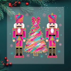 May include: A festive illustration features two pink and gold nutcrackers flanking a colorful Christmas tree. The tree and nutcrackers have a brushstroke design with gold accents. Snowflakes and a bow complete the holiday scene.