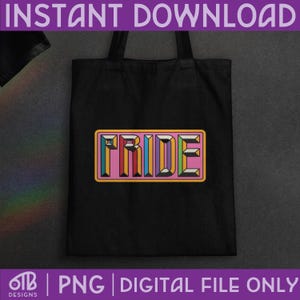 May include: A black tote bag featuring a rectangular graphic with the word PRIDE in block letters. Each letter is filled with vertical stripes of various colors including red, orange, yellow, green, blue, and purple, set against a pink background.